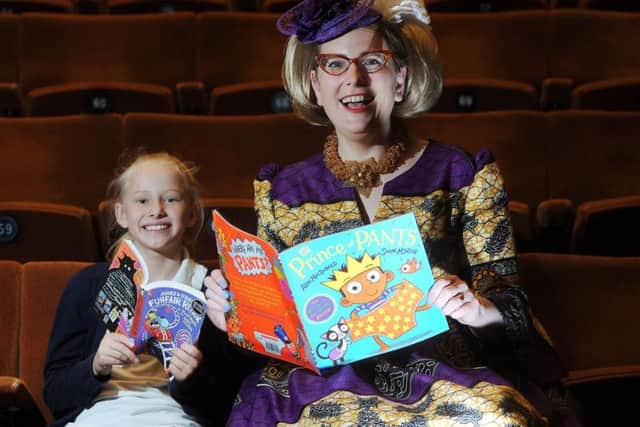 Intake Primary School pupil Megan Cooper meets up with author and illustrator Sarah McIntyre at Sheffields 29th Childrens Book Awards at The Crucible Theatre . Picture Scott Merrylees