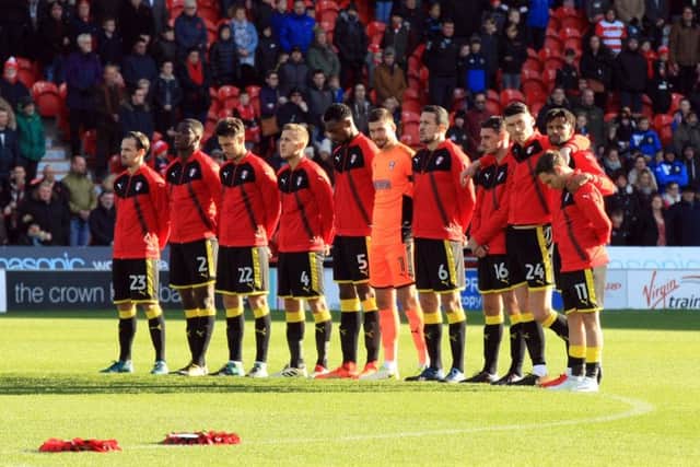 Rotherham players - 2 minutes silence. Picture: Chris Etchells