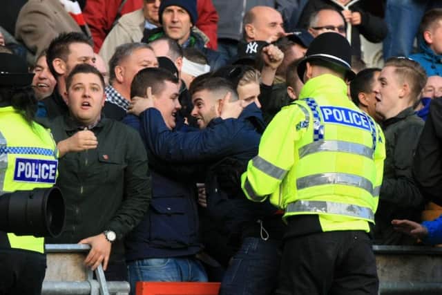 Doncaster Rovers v Rotherham United at the Keepmoat Stadium - Saturday November 11th 2017. Rotherham fans celebrate after scoring late on. Picture: Chris Etchells