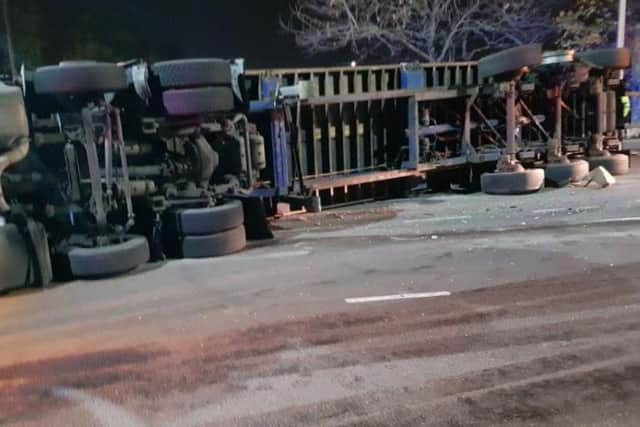 A road in Sheffield was closed for hours after a lorry overturned