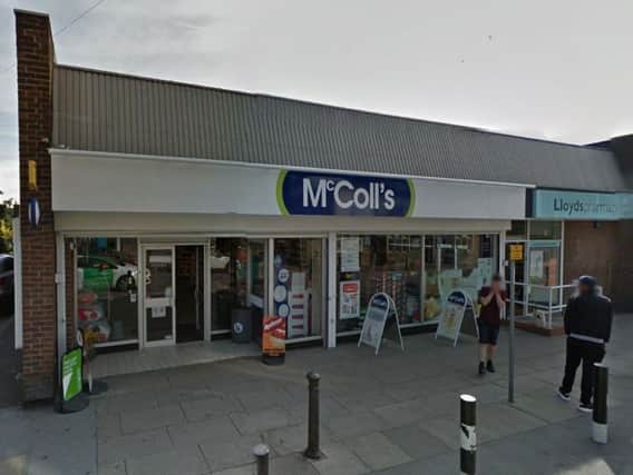 The woman was robbed in the shop door way of McColl's in Woodhouse. Picture: Google