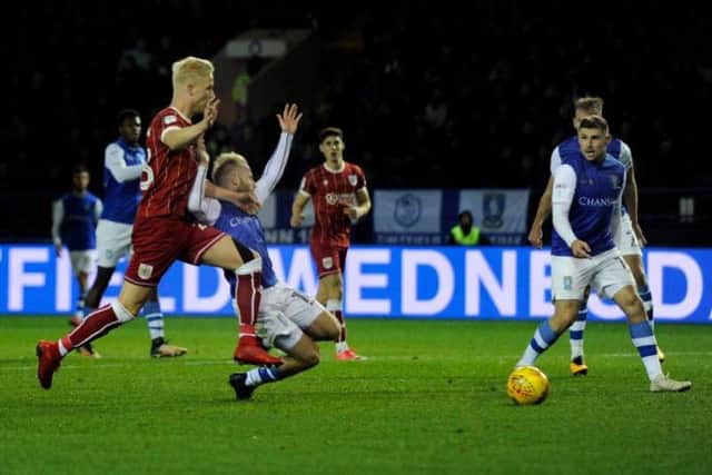 Barry Bannan goes down in the box but no penalty was given
