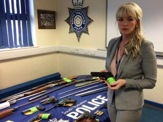 Detective superintendent Una Jennings with some of the weapons handed in.
