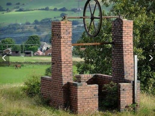 The old mine head wheel shaft, which the owners say is being restored so it can be returned to the site