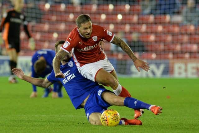Joe Ralls slides in on George Moncur.
Barnsley FC v Cardiff City.  Oakwell, Barnsley.  SkyBet Championship.
21 November 2017.  Picture Bruce Rollinson
