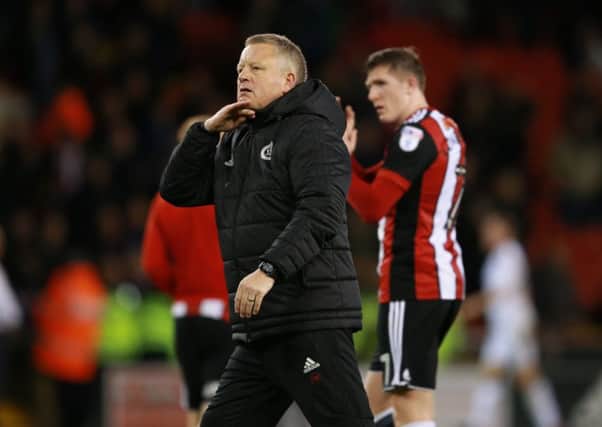 Chris Wilder manager of Sheffield Utd signals for the fans to keep their chins up after defeat to Fulham. Pic Simon Bellis/Sportimage