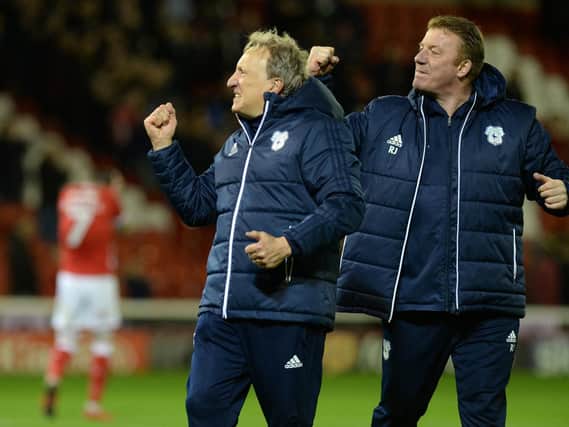 Neil Warnock celebrates his side's win at Oakwell