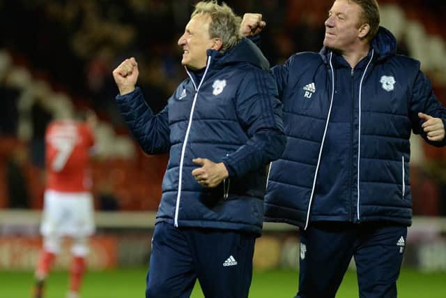 Neil Warnock celebrates his side's win at Oakwell