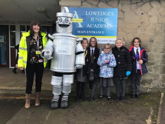 Phil the Bin with Ameys Streets Ahead Community and Employee Engagement Officer Helen Johnson and litter pickers from Low Edges Junior Academy in Sheffield.