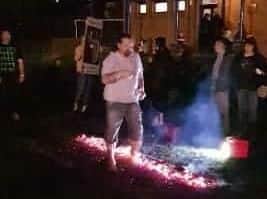 Phil completing his sponsored fire walk, which raised more than 1,000 to beef up security at the cats shelter