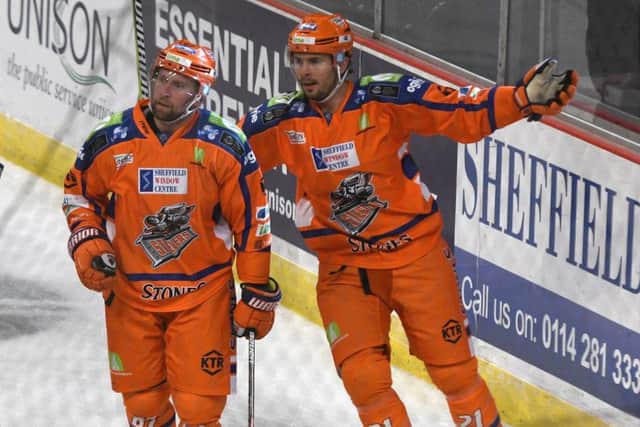 Sheffield Steelers' players celebrate Colton Fretter's goal against Coventry Blaze.