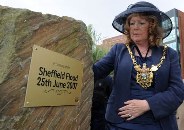 The Lord Mayor Coun Anne Murphy unveils a plaque to commemorate the 10th anniversary of the 2007 floods.