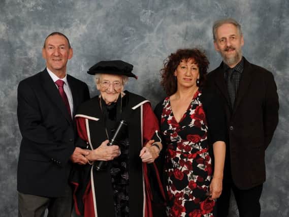 Dorothy Fleming with her family after receiving her honorary doctorate