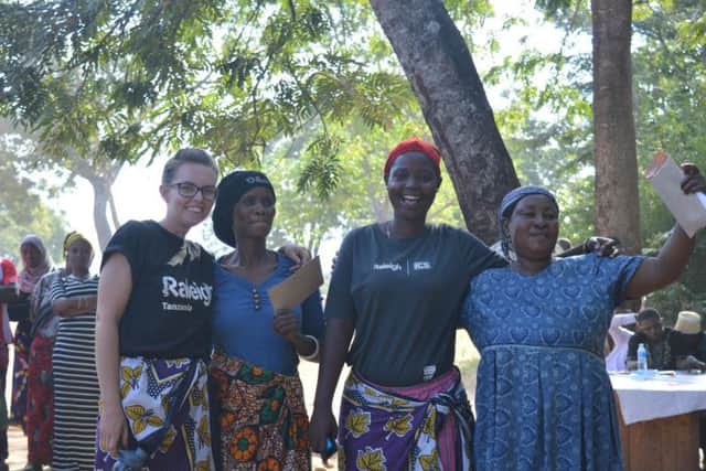 Madalaine Thomas, with local residents in Tanzania