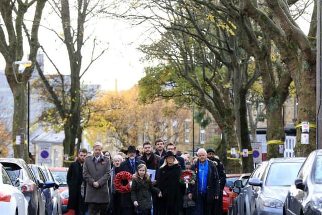 An Armistice Day commemoration on Western Road