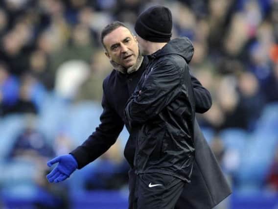 Carlos Carvalhal has a word with the fourth official during Sheffield Wednesday's draw with Hull City