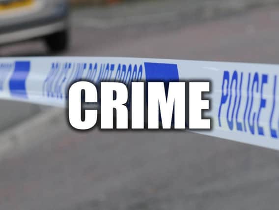 A 44-year-old woman has been left with a number of injuries after being robbed and sprayed in the face with an unknown subtance in a South Yorkshire underpass.