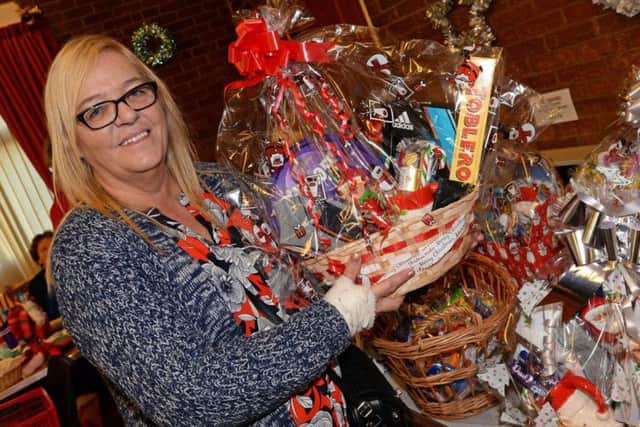Paula Smith, pictured with her Christmas hampers.