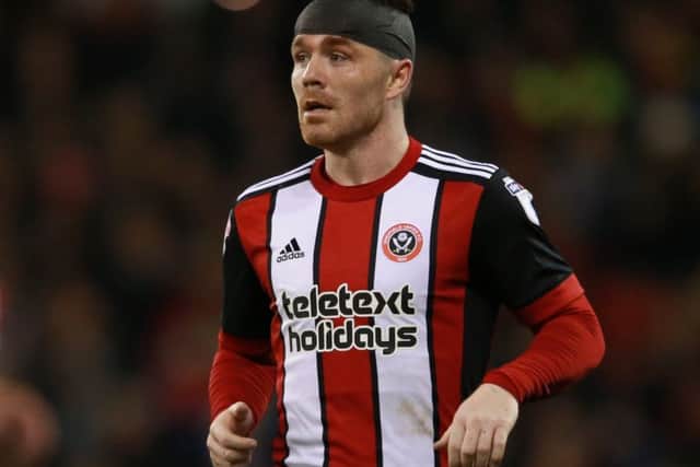 John Fleck will miss tomorrow's game through suspension: Simon Bellis/Sportimage