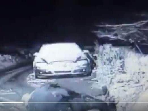 A police officer was captured slipping on ice in the Peak District