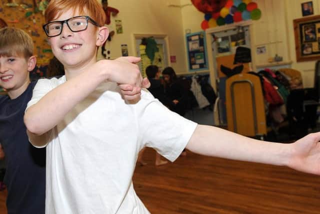 Year 6 pupils Flynn and Solly of Malin Bridge Primary School practice their dance moves in their PE lesson