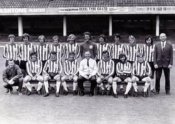 Sheffield United   pictured in  July 1971.
Back row left to right: Alan Woodwoard, Colin Addison Ted Hemsley, Len Badger, Tony Currie, John Hope, Geoff Salmons, John Flynn, Dave Powell, Frank Barlow, John Short (Coach)
Front row left to right: Ces Coldwell (Trainer), David Ford, Bill Dearden, Gil Reece, John Harris (Manager), Eddie Colquhoun, Trevor Hockey, Stuart Scullion