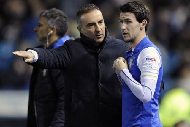 Owls head coach Carlos Carvalhal with currently injured Kieran Lee...Pic Steve Ellis