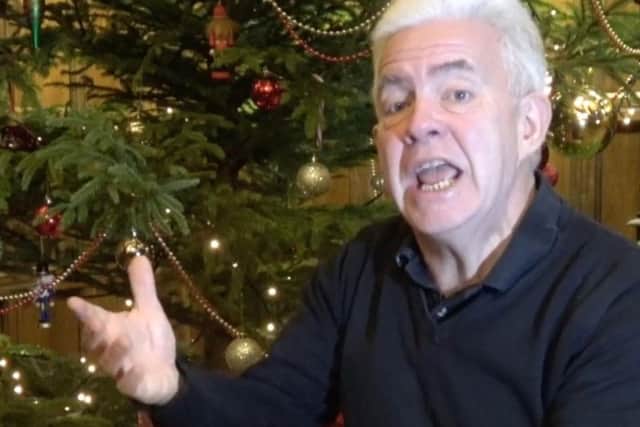 Ian sings his unique twist on the classic festive rhyme under the giant Christmas tree at Cannon Hall