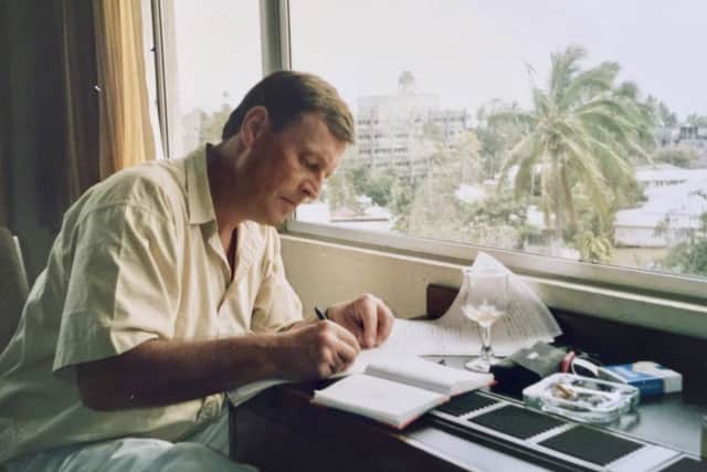 Jeremy Thompson, writing a script in Manila in 1988