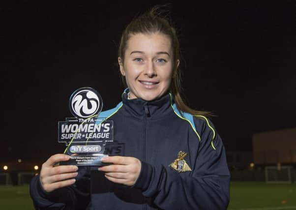 Christie Murray, pictured with the FAWSL2 Player of the Month award for November. Photo: Anna Gowthorpe for FA