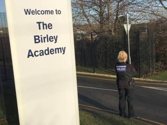 Police officers are at Birley Academy, Birley