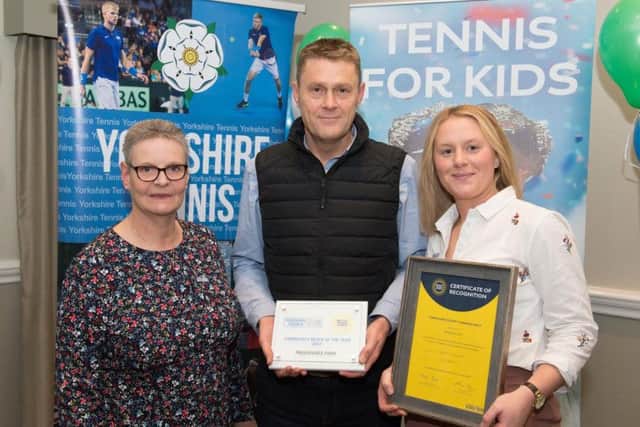 Alison Steel, partnership manager at Parks Tennis CIC; Paul Billington, director of culture and environment at Sheffield Council; and Jess Redfearn, community tennis manager at Parks Tennis CIC, with the award (photo: Tim Hardy Photography)