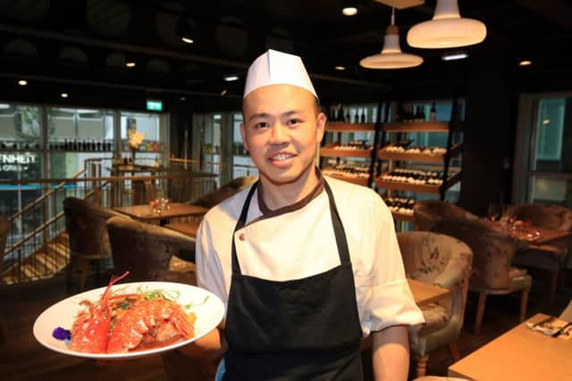 Food review at Oisoi Restaurant, St Paul's Place, Sheffield. Pictured is chef Wayson Ang. Picture: Chris Etchells