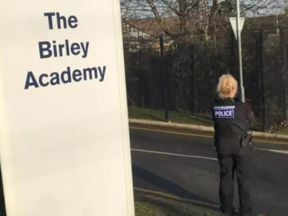 Police officers searched Birley Academy yesterday for a bomb