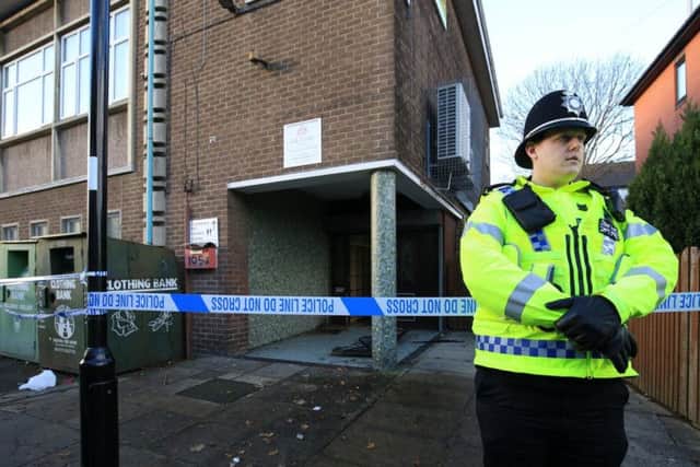 Police outside the centre.