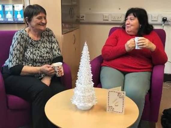 Glynis (left) and Lorraine chat away at Weston Park Cancer Charity Support Centre