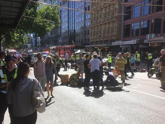 A car ploughed into pedestrians outside a train station in Australia