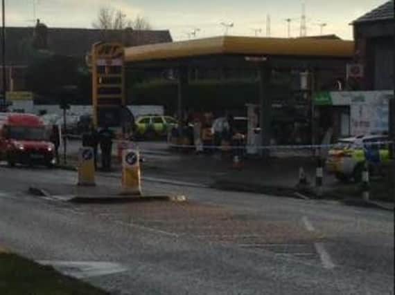 A man was shot on the forecourt of a petrol station in Sheffield