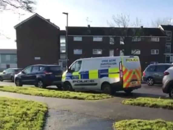Detectives remain at the scene of a murder in Sheffield