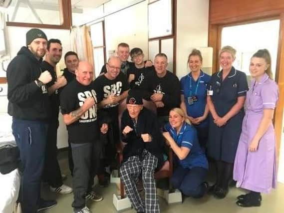 Bill Wild with members of Sheffield Boxing Centre and staff at Royal Hallamshire Hospital (photo: Sheffield Teaching Hospitals)