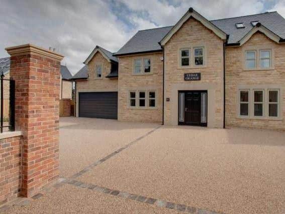 The five-bedroom house is gated and covered by CCTV (photo: Blenheim Park Estates/Zoopla)