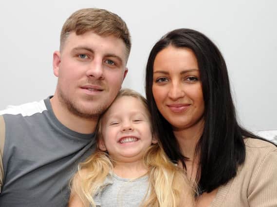 Smiley Myla needs a bone marrow transplant after doctors revealed she has a 'one in a million' condition. Dad John and mum Danielle are urging people to sign up to the donation register in an attempt to find a cure for her. Picture: Andy Roe/The Star