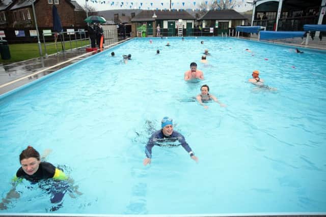 Brave souls take to the water in the annual open air swimming event at Hathersage Swimming Pool, Hathersage, United Kingdom, 1st January 2017. Photo by Glenn Ashley.