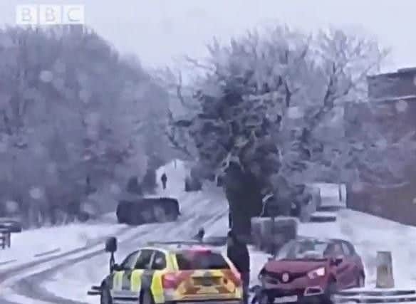 The moment the car overturned. Pic and video by @OliConstable / BBC Radio Sheffield