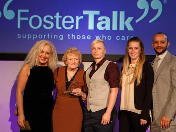 Anne Shaw, from Sheffield, has been awarded an MBE. She is pictured receiving the Long Service Award at the annual FosterTalk Foster Carer Awards.