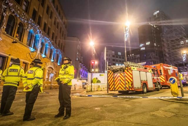 Emergency services at the scene of a fire at a 12-storey building in the Northern Quarter of Manchester. PRESS ASSOCIATION Photo. Picture date: Saturday December 30, 2017. Images posted on social media show smoke billowing out of the building on Joiner Street in the city, while crowds of people watch on from below. Photo: Danny Lawson/PA Wire