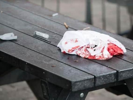 A blood stained shirt was left outside Crystal after a knife attack in the early hours of this morning (Dean Atkins)