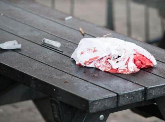 A discarded blood stained shirt outside Crystal on Carver Street (Dean Atkins)
