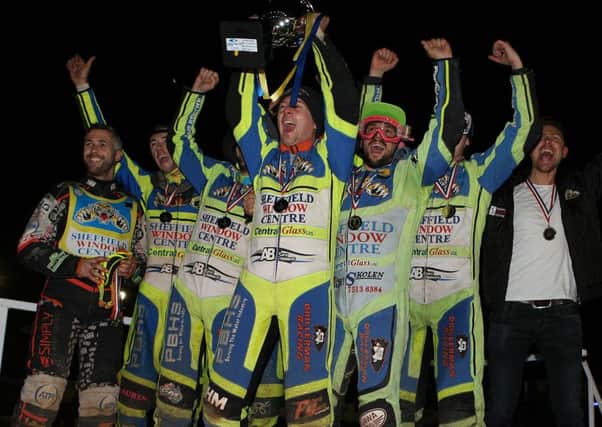 Kyle Howarth and the Sheffield Tigers speedway team with the championship trophy. Picture: Phil Hilton