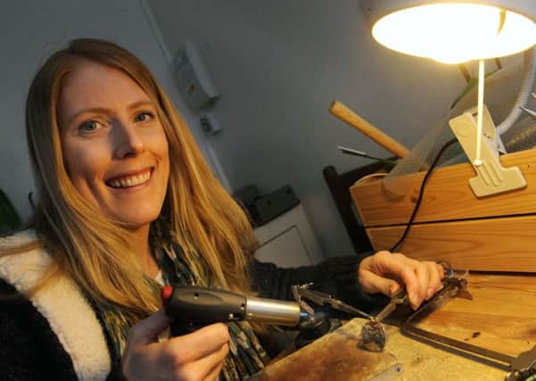 Pictured is Ali Worthy making her own jewellery in a hut at the bottom of her garden in,Sheffield......Pic Steve Ellis